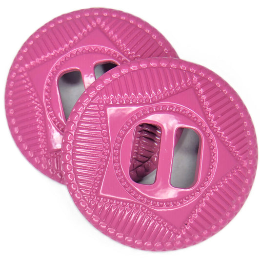 A pair of pink conchos.